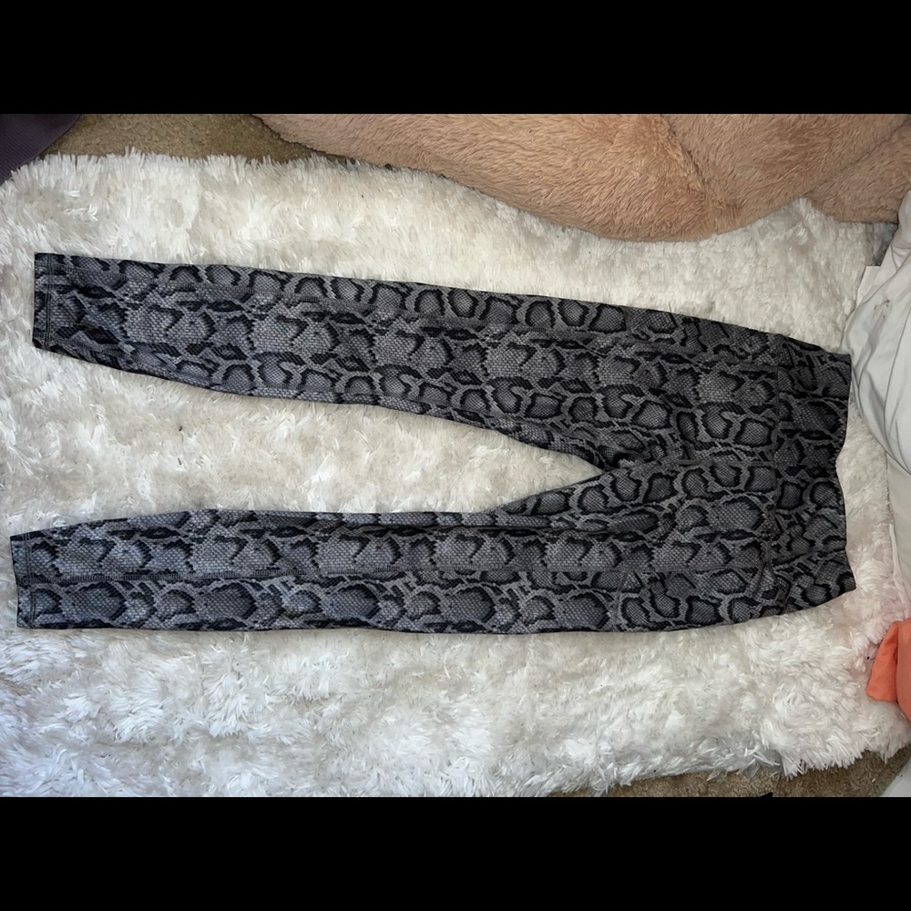 3 pair of leggings, snake prints, purple , & khaki